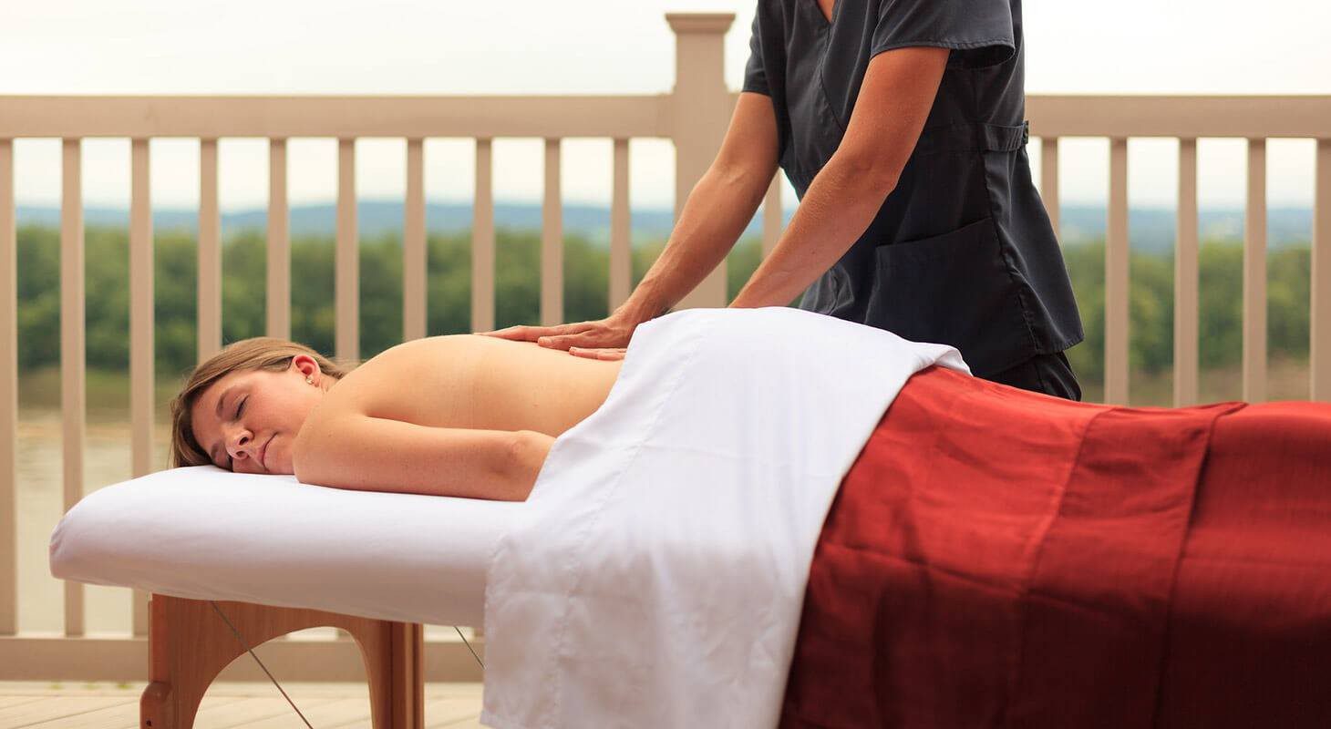 An image of woman taking a touch spa