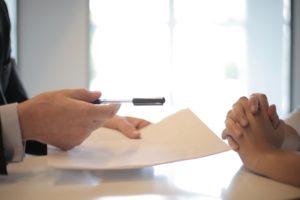 corporate professional interviewing a woman